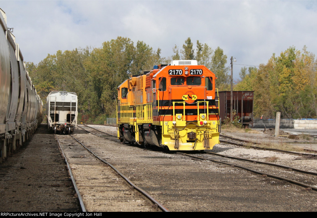 Both GP38's wait tied down in the next track over from the cars they brought up from Holland earlier in the day